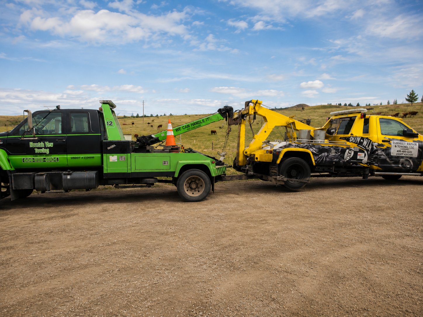 Mountain View Towing trucks performing a roadside recovery near Anaconda, Montana